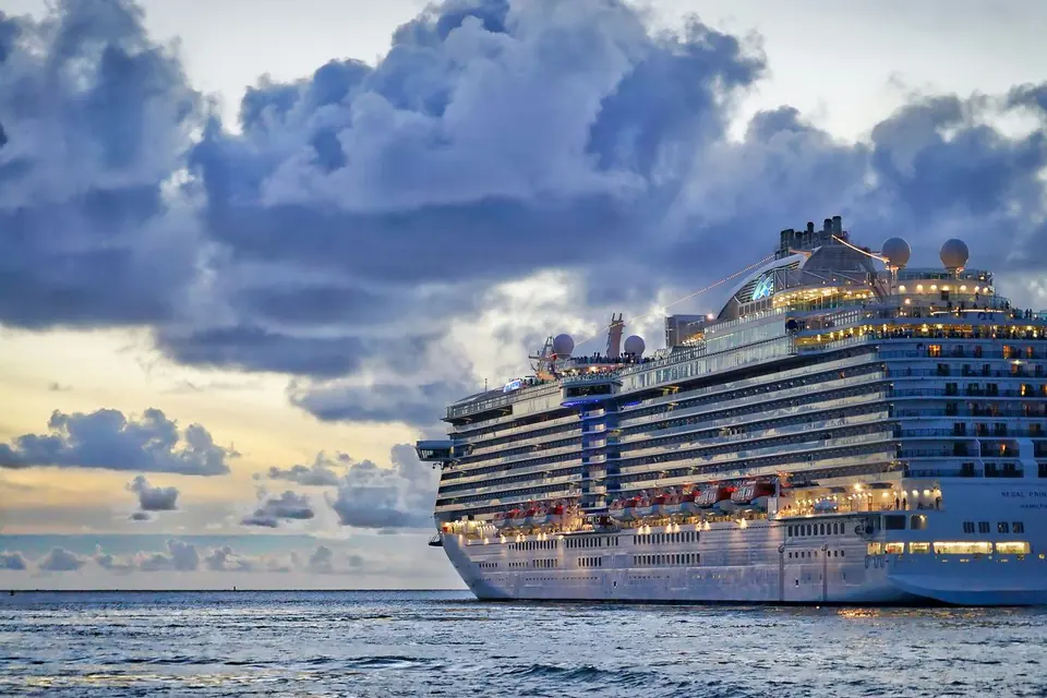 Cruise ship lit up at dusk
